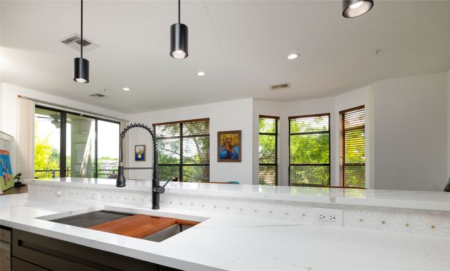 Kitchen opens living area | Image 15