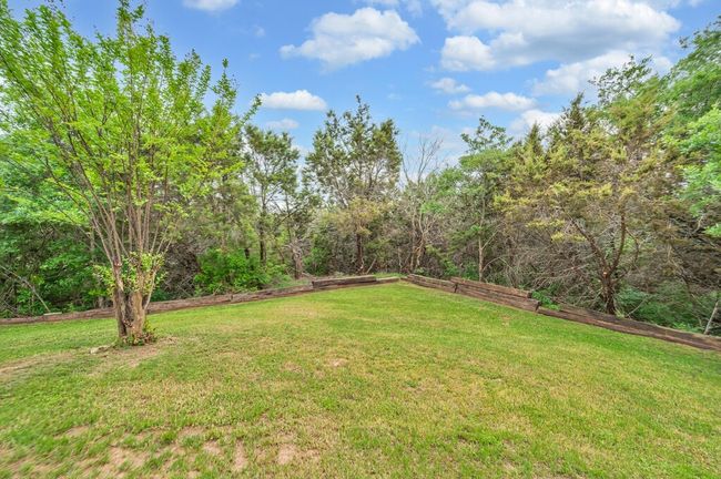 View of expansive backyard | Image 37