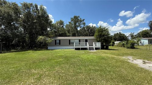 203 Gladys Fewox Rd, MULBERRY, FL, 33860-8566 | Card Image