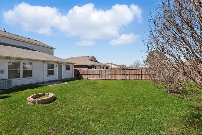 View of yard featuring a fire pit | Image 26