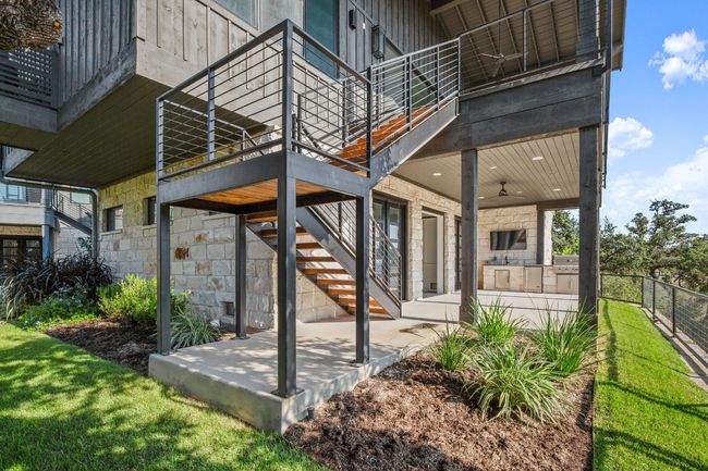 Lower level patio with outdoor kitchen. | Image 27