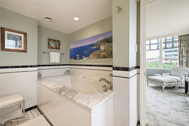 Primary bath featuring a garden tub | Image 14