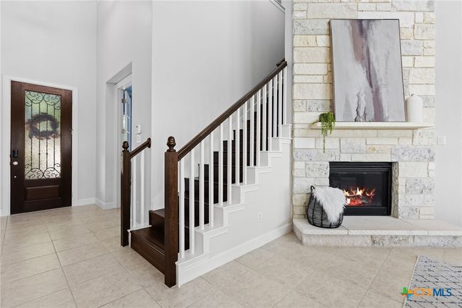 Fireplace and stairs | Image 17