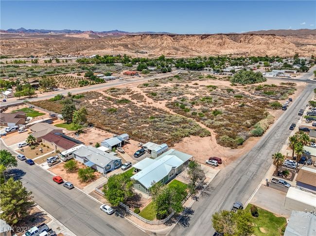 Aerial view of a mountain backdrop and a desert landscape | Image 39