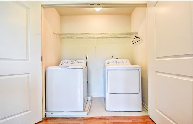 2nd floor laundry room featuring washer and dryer | Image 26