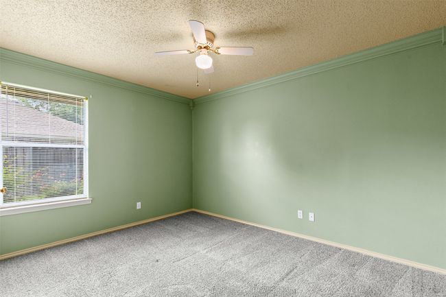 Two additional bedrooms are generously sized with walk-in closets. | Image 19