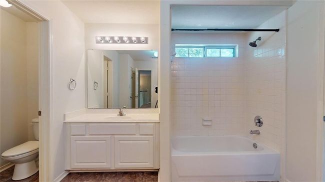 Spacious second full bathroom upstairs, perfect for guests. | Image 34