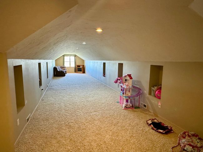 Bonus room above garage | Image 43
