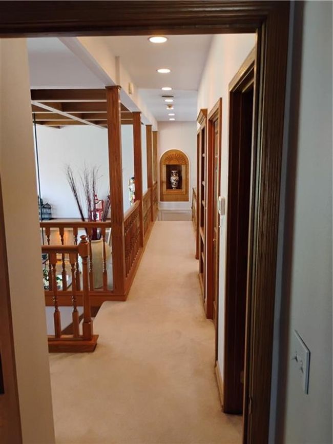 Upstairs corridor featuring recessed lighting and light carpet | Image 72