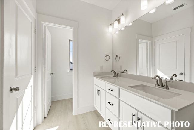 Plenty of room for two in this lovely owner's bath! REPRESENTATIVE PHOTO | Image 11