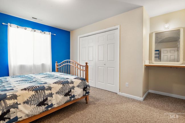 2nd bedroom is on lower level & has desk area, carpet, a closet and baseboards | Image 30