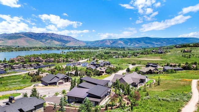 Aerial view of residential area with a water and mountain view | Image 109