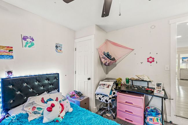 bedroom featuring ceiling fan | Image 14