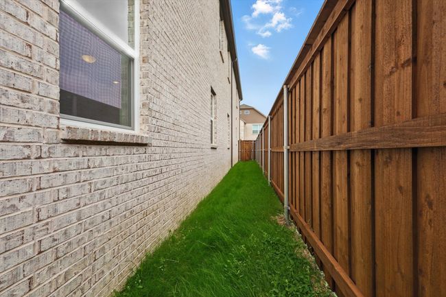 View of property exterior with brick siding | Image 35