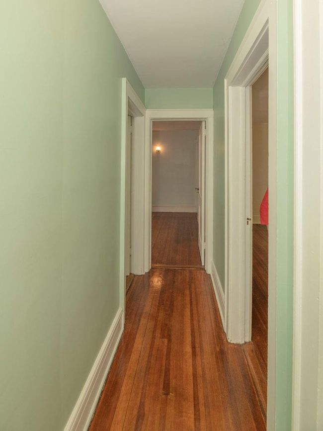 Hall featuring dark wood-type flooring | Image 23