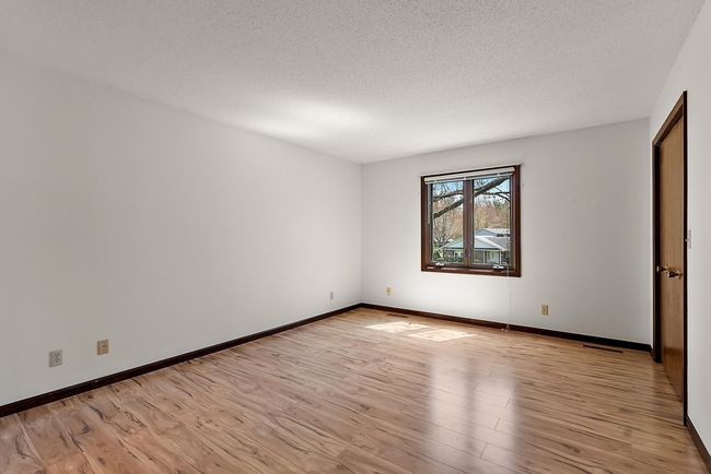 Primary suite with vinyl flooring. | Image 19