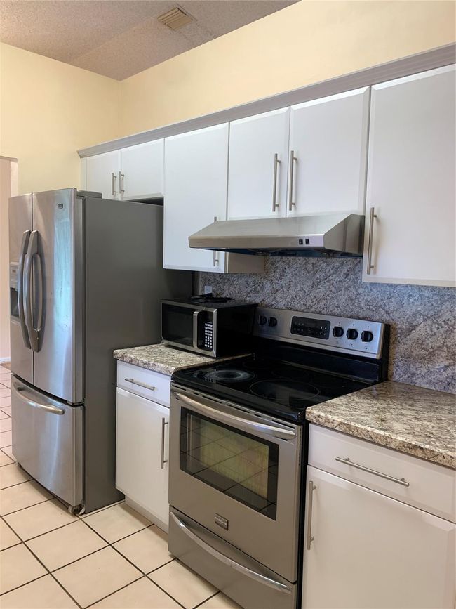 9840 Nw 28 Th Ct, House other with 4 bedrooms, 2 bathrooms and null parking in Coral Springs FL | Image 20