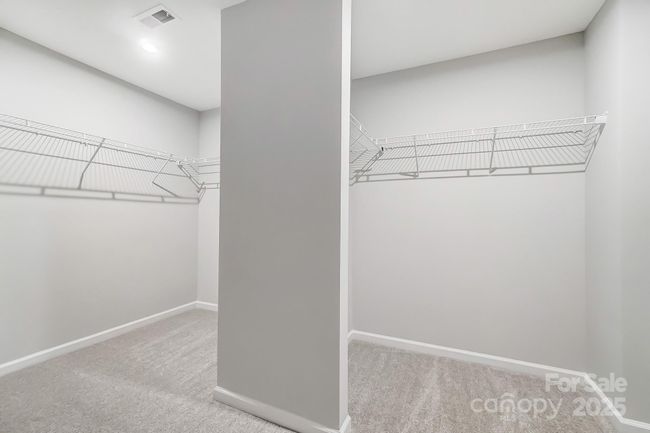 PRIMARY BEDROOM WALK-IN CLOSET | Image 35