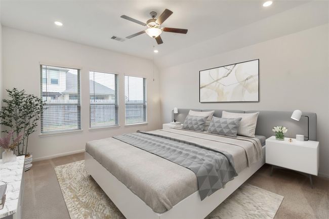 Virtually staged primary bedroom has large windows and plenty space to fit up to a King size bed. | Image 23