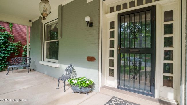 Front door with unique transom and side lights. | Image 5