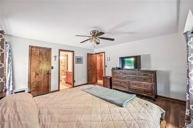Comfortable primary bedroom with en suite | Image 28