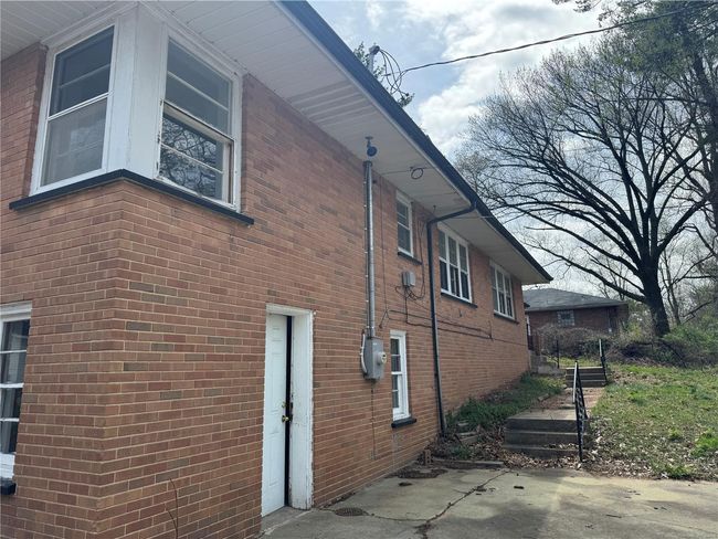 View of side of property featuring brick siding | Image 18
