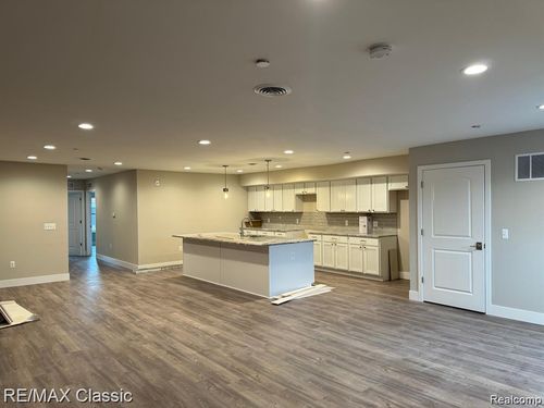 115 W Main St, Brighton, MI, 48116-1521 | Card Image