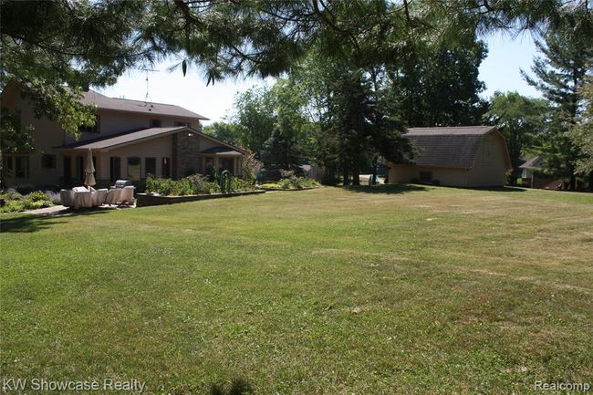 Back of yard, looking toward house. | Image 61