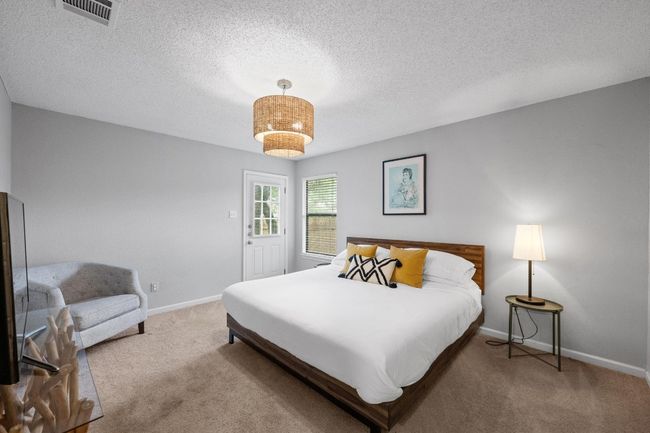 Large primary bedroom with door to exterior could be used as airbnb space.. | Image 16