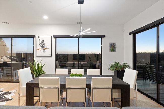 Dining Room open to family room and kitchen with panoramic views | Image 13