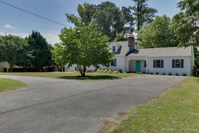 View of front of home with a front yard | Image 1