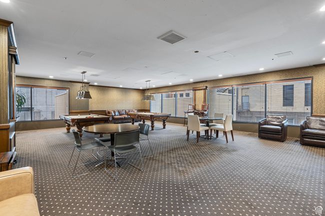 Rec room featuring billiards, plenty of natural light, and carpet floors | Image 35