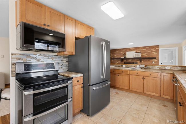 7629 S Cedar Cir, House other with 5 bedrooms, 3 bathrooms and 2 parking in Littleton CO | Image 13