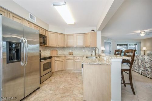 c102-9589 Crescent Garden Dr, NAPLES, FL, 34109-4544 | Card Image