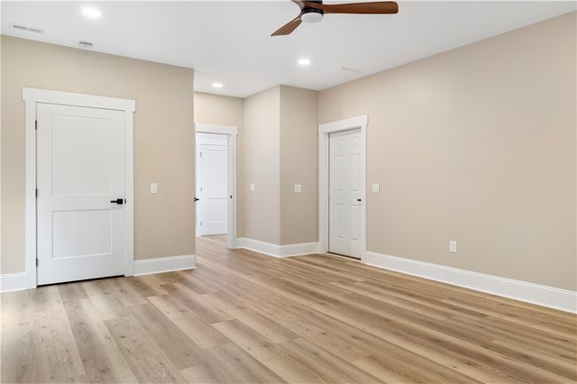 Flex room, game room, theater, or additional large bedroom with exterior access. | Image 26