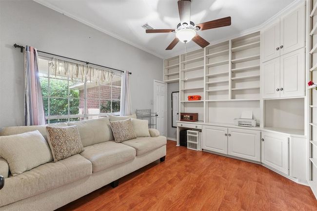Potential 4th bedroom. Office space with built-ins, adjustable shelving, closet space | Image 15