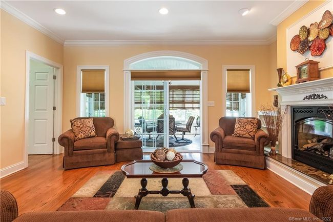 The decorative crown molding throughout the home adds a refined look. Note the detailed molding around the doorway. | Image 14