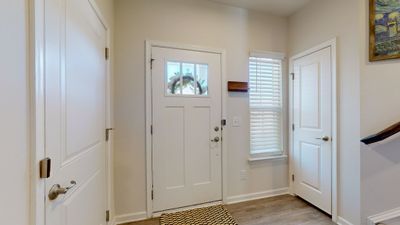 The front door is beautiful on the inside as well as the outside! No squeezing in guests in this large foyer. | Image 3