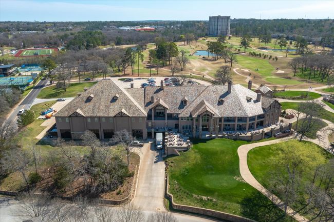 Aerial overview of property's location featuring a golf course and a nearby body of water | Image 39