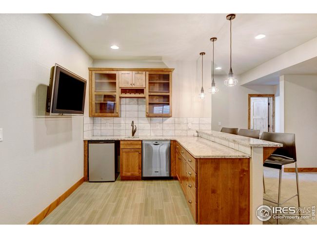 6940 Summerwind Ct, House other with 4 bedrooms, 3 bathrooms and null parking in Timnath CO | Image 28
