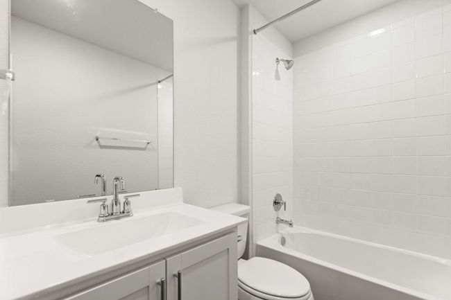 Full bathroom with toilet, vanity, and bathtub / shower combination | Image 12