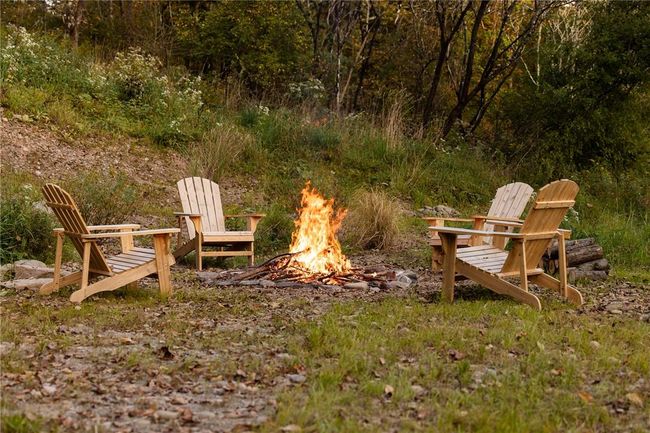 View of yard featuring a fire pit | Image 16