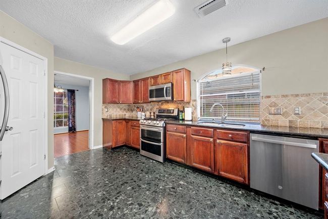 1802 Moston Dr, House other with 6 bedrooms, 4 bathrooms and 2 parking in Spring TX | Image 7