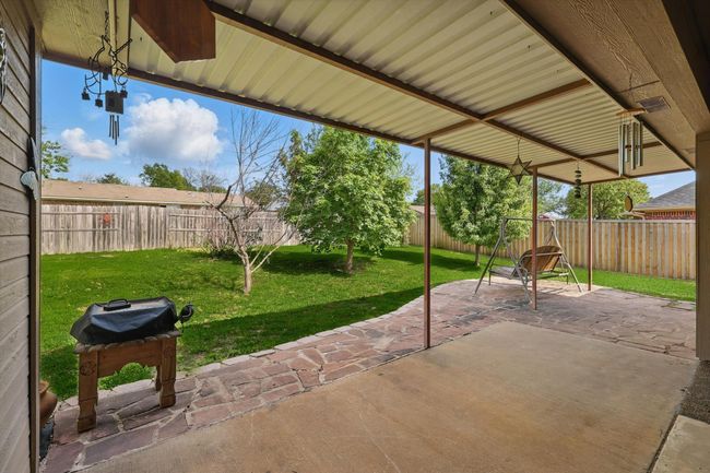 View of patio / terrace featuring a fenced backyard and area for grilling | Image 30