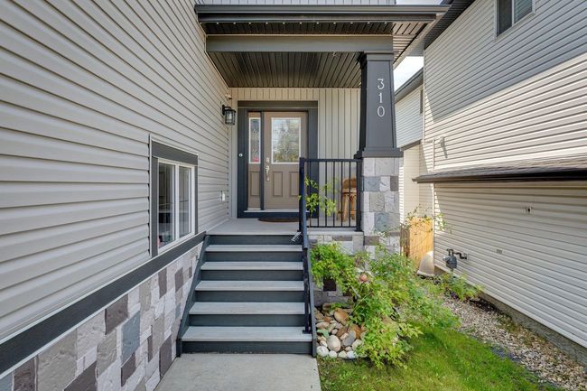 310 Kingsbury View Se, House other with 4 bedrooms, 4 bathrooms and 5 parking in Airdrie AB | Image 4
