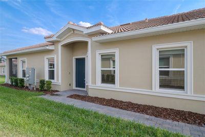 1075 Quaker Ridge Lane, Townhouse with 2 bedrooms, 2 bathrooms and null parking in Champions Gate FL | Image 2