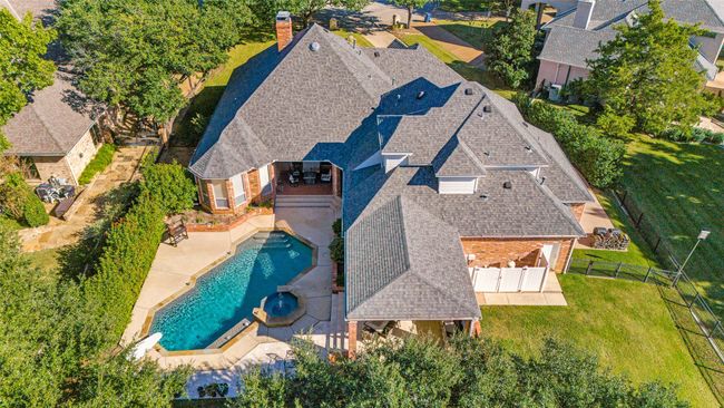 View from above of property with a pool area | Image 34