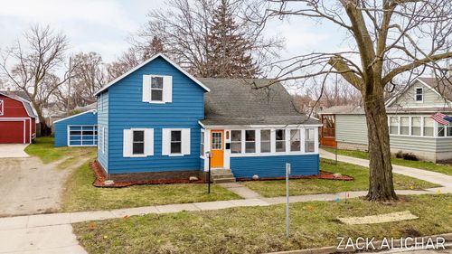 520 Monroe Ave, Grand Haven, MI, 49417-1063 | Card Image