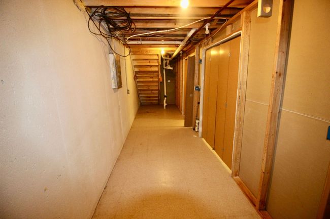 Tons of storage under stairs. | Image 27