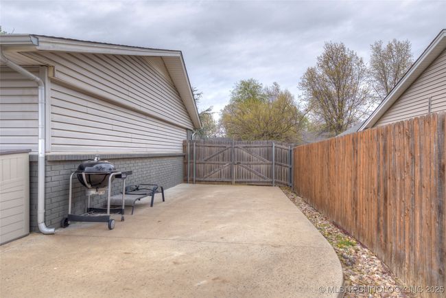 Behind the double gate, There is an ample parking pad for your RV/Camper or boat! | Image 25